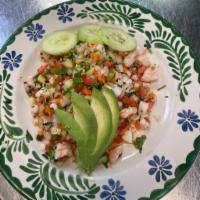 Ceviche · Your choice of shrimp or fish cooked with lime juice, cilantro, onions, tomatoes, carrots an...