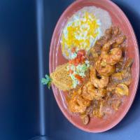 Camarones a La Diabla · House specialty. Shrimp sauteed with garlic, butter, mushrooms and spices. Covered with spec...