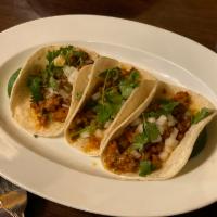 Spicy Chorizo Tacos * · Sweet jalapeño sauce, onions, bell peppers, cilantro