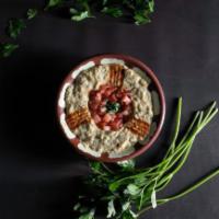Baba Ghanouj · Baked eggplants with fresh diced tomatoes & onions
