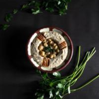 Hummus · Chick peas with sesame sauce, lemon juice & olive oil