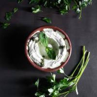 Lebneh w/ Garlic · Yogurt spread with dry mint & olive oil