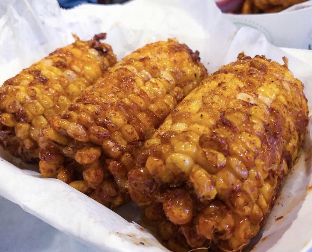 Fried Corn · Fried corn on the cob topped with our house Cajun spices. Finally, a corn that won’t stick to your teeth!