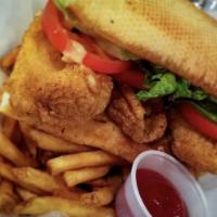 Fried Catfish Sandwich · Fresh catfish is moist, sweet with a firm flesh and less flake,
hand-battered and fried to p...