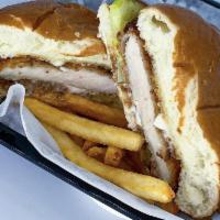 Fried Chicken Sandwich · Southern fried chicken sandwich with Cajun spices, mayo, and just enough pickles. Served wit...