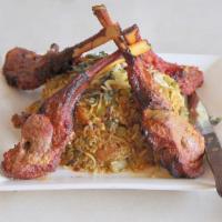 Lamb Chops · Succulent pieces of lamb chops marinated in spices then broiled on skewer over charcoal in t...