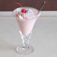 Falooda · Rose flavored milk mixed with falooda sev, tukmurai seeds and topped with ice cream.