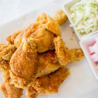B. Crispy Fried Chicken · A light flaky texture with an option of either mild or spicy soy garlic glaze.

