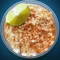 Elote (Corn in a Cup) · Made in house, street style corn with mayo, topped with Mexican crema, cotija cheese and chi...