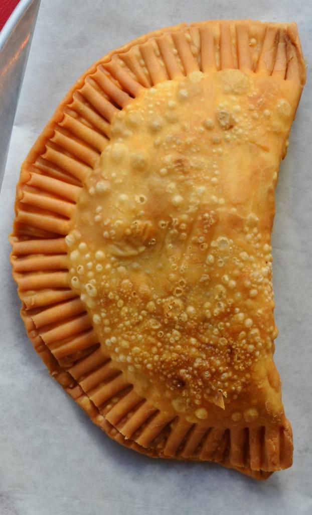 Empanada · Fried pastry filled with cheese and your choice of ground beef, shredded chicken, chorizo or veggies.