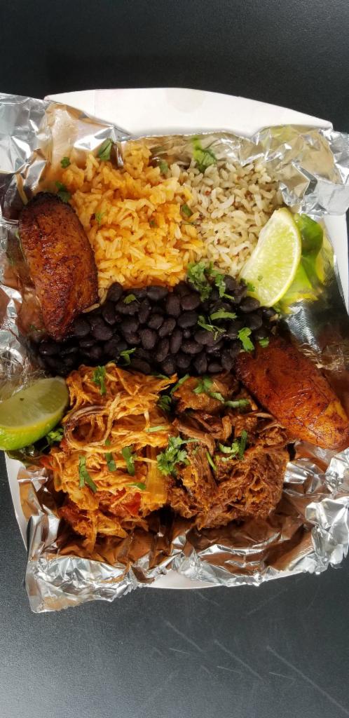 Cuban Bowl · Barbacoa, shredded chicken, black beans, plantains, 2 kinds of rice and lime wedge.
