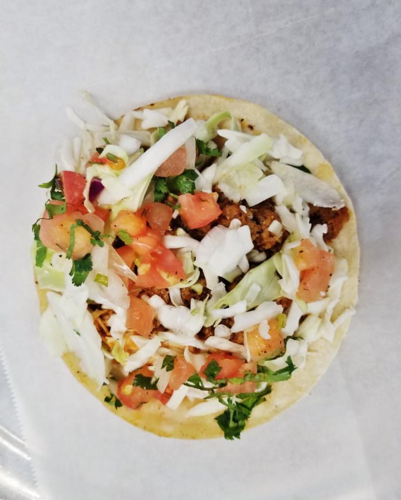 Locos Taco · Corn tortilla with you choice of protein, topped with chorizo sausage, pico de gallo, shredded cabbage, cilantro and lime.