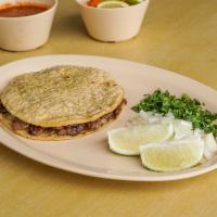 Maiz Quesadilla con Carne · Corn tortilla with meat of your choice.