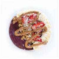 Almond Lover Acai Bowl · acai, banana, blueberries, strawberries, honey. Topped with housemade granola, unsweetened s...