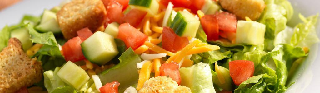 Garden Salad · Spring mix greens piled with diced tomatoes, crisp cucumbers, cheddar cheese, Monterey Jack cheese, and croutons, and your choice of salad dressing.