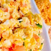 Huevos a la Mexicana · Two scrambled eggs with jalapeno, tomato and onions (Rice and beans).