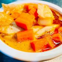 Caldo de Pescado · Fish soup (Rice, onions, cilantro and limes on the side).