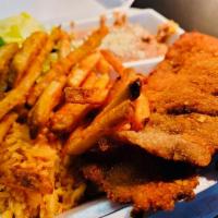 Milanesa de Res · Breaded steak (Rice, beans and Salad).