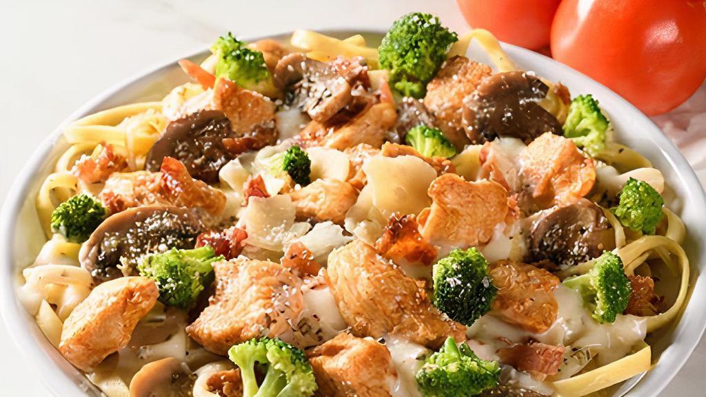 Loaded Fettuccine  · Alfredo, chicken, bacon, seasoned mushrooms, Parmesan-roasted broccoli.