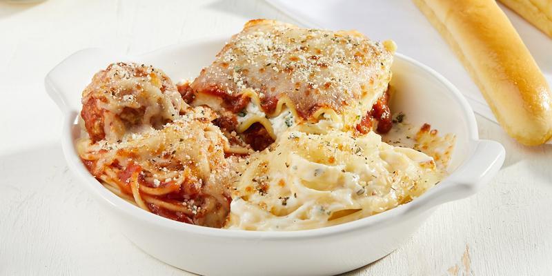 14. Oven-Baked Classic Sampler · Fettuccine Alfredo, lasagna with meat sauce, spaghetti and meatball baked with mozzarella and provolone cheese.