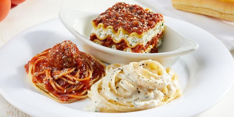 15. Classic Pasta Sampler · Fettuccine Alfredo, lasagna with meat sauce and spaghetti and meatball.