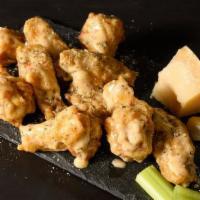10 Traditional Wings · 10 bone-in wings with your choice of two flavors. Includes celery and your choice of ranch o...