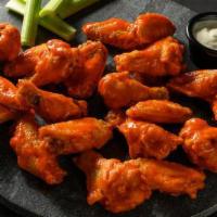 20 Traditional Wings · 20 bone-in wings with your choice of two flavors. Includes celery and your choice of ranch o...