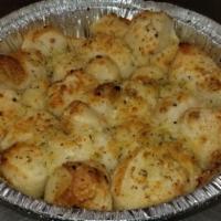 Garlic Parmesan Blast · Balls of dough rolled in Parmesan and Italian spices drizzled with garlic butter baked to a ...