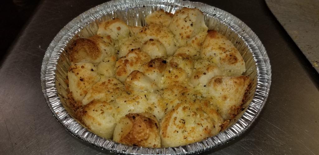 Garlic Parmesan Blast · Balls of dough rolled in Parmesan and Italian spices drizzled with garlic butter baked to a golden brown.