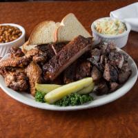 Wings, Ribs and Burnt Ends Platter · Six slow-smoked wings, a half slab of St. Louis ribs, and your choice of pork, pork belly, o...