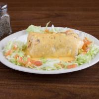 Macho Man Burrito · Stuffed with beans and rice, covered in chile con queso. Served with lettuce, tomatoes and s...