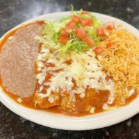 Enchiladas Enchipotladas · Served with 3 enchiladas, refried beans, rice and salad. Choice of ground beef, shredded chi...