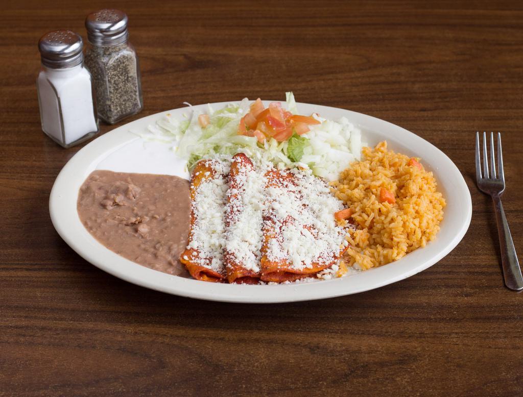 Enchiladas Mexicanas · 3 enchiladas filled with queso fresco, shredded chicken or potato topped with queso fresco. Served with salad, onions and sour cream. Served with 3 enchiladas, refried beans, rice and salad.