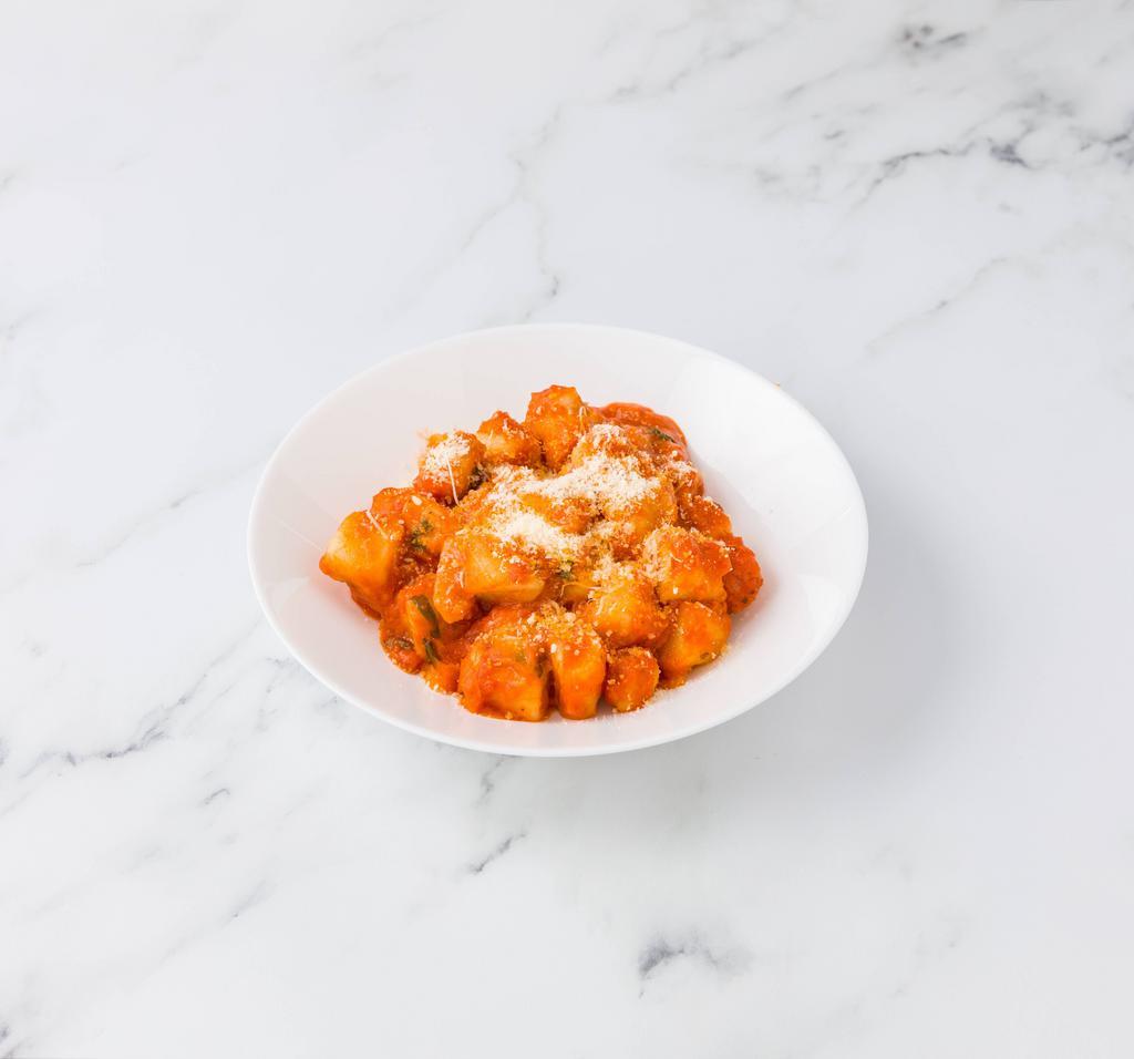 Gnocchi Sorrentina · Tomato Sauce, Fresh Mozzarella and Basil