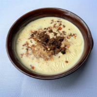 Queso Blanco with Ground Beef Chorizo · Our signature queso blended with ground beef chorizo.