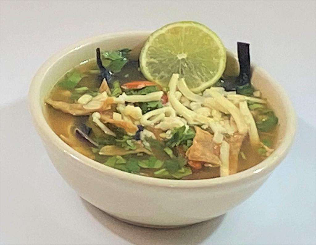 Tortilla Soup  · A pint or quart of our homemade chicken soup with chicken, carrots, celery, herbs, hint of chipotle and lime. Garnished with red onions, tomato, and cilantro. Served with jack cheese and tortilla strips