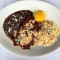 BLUE CORN CHEESE ENCHILADA · Two enchiladas with jack cheese blended with a touch of grated red onion. Rolled in a corn t...