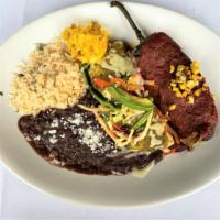 CHILE RELLENO-ENCHILADA COMBO  · Cheese relleno with 3 -chile red sauce and smoked chicken enchilada with coconut lime rice, ...