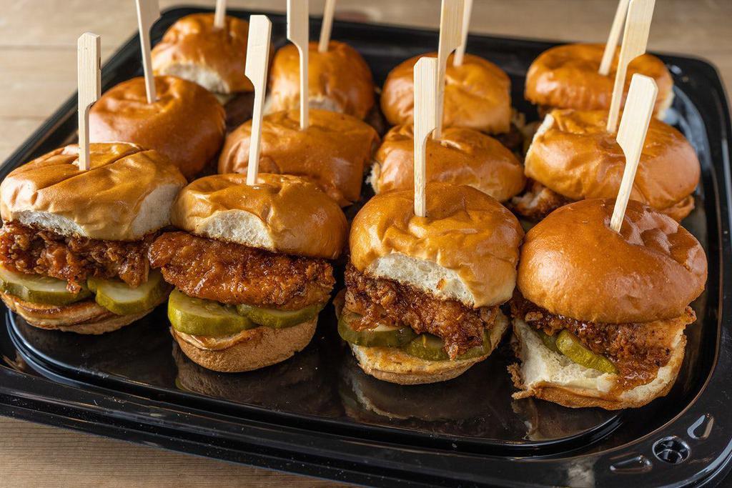 Hot Honey Chicken Sliders Platter · dozen buttermilk marinated fried chicken with hot seasoning, signature jalapeno honey, and pickles on toasted brioche buns