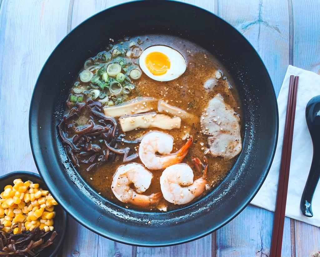 Roasted Black Garlic Ramen · Comes with Chashu Pork, Mushrooms, Bamboo, Half Egg, 2 Shrimp and Green Onions on a Shoyu (Soy Sauce) Base Broth