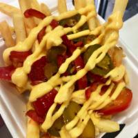 Spicy Cheesy Fries · Smothered with Frank’s Hot Sauce & Cheese With or Without Hot Cherry Peppers On Top