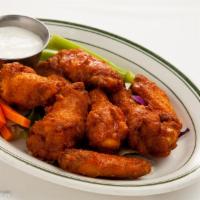 Buffalo Wings · Cooked wing of a chicken coated in sauce or seasoning. Red hot.