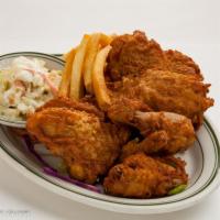 Mels Southern Fried Chicken Dinner · Fried crispy on the outside, tender and juice on the inside with coleslaw, fries, roll and h...