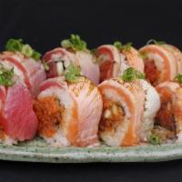 Spicy Summer Roll · Spicy tuna roll with seared tuna, salmon, albacore and ponzu sauce.