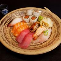 Tokyo Sushi Combo · 12 pieces. 2 tuna, 2 salmon, 1 white fish 1 albacore, 1 eel, 1 shrimp with 4 pieces Californ...