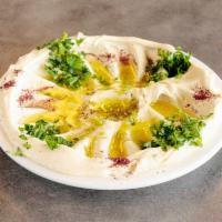 Hummus Dip · Pureed chick peas, tahini, lemon juice, olive oil and jalapeno pepper.