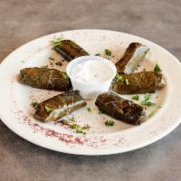 Veggie Grape Leaves Platter · Stuffed with carrots, parsley, dill weed, onions and rice.