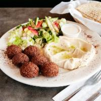 Falafel Veggie Platter · Fried ground chicken peas pattern with spices, onion and parsely.