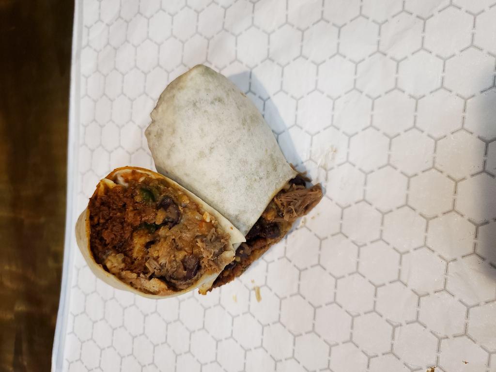 Josè Calientè  · Slow roasted pork with spicy chorizo, pepperjack cheese, fresh jalapenos, black beans, rice and hot salsa.