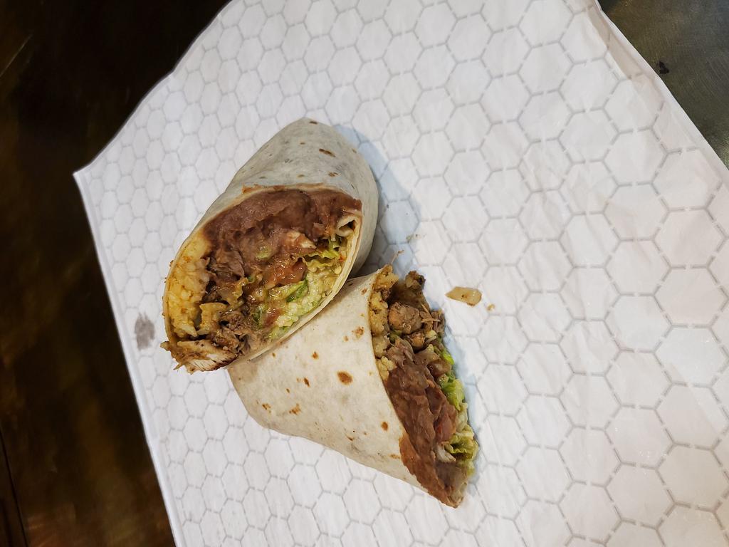 The 3 Amigos · Marinated chicken, slow roasted pork and our seasoned ground beef, with rice, refried beans, lettuce, tomatoes, mild salsa verde, quesadilla cheese and our homemade avocado cream.